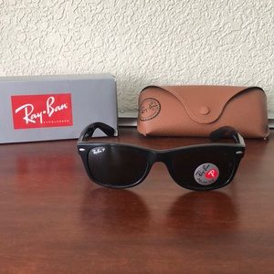 Never worn Ray Ban Wayfarers Polarized